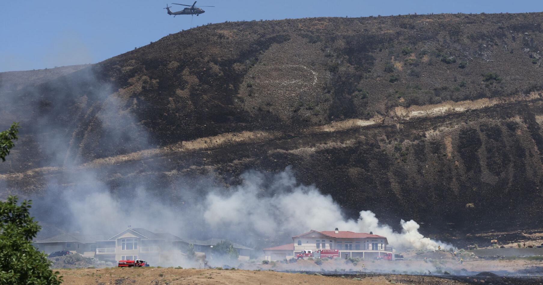 Firefighters battling brush fire Friday near homes on Yakima Ridge - Vimarsana News
