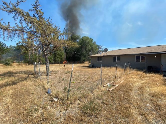 Crews battling brush fire threatening a few homes west of Wapato Local
