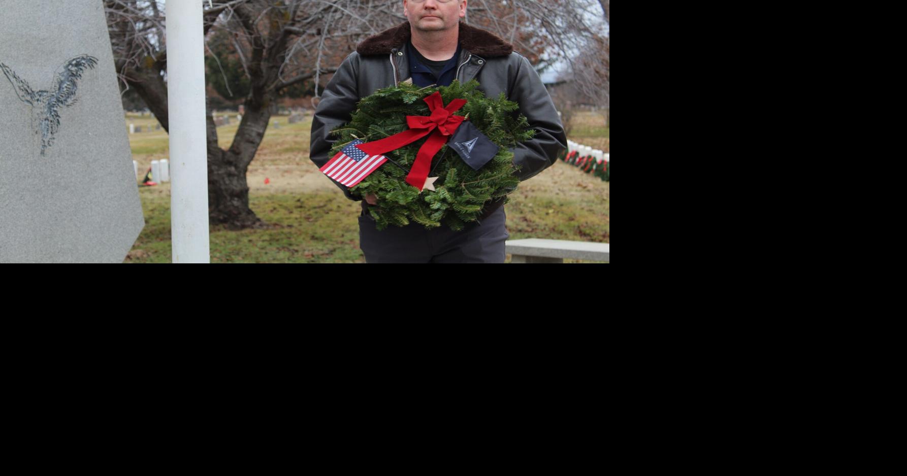 Honoring the fallen Veterans place wreaths on graves at Tahoma