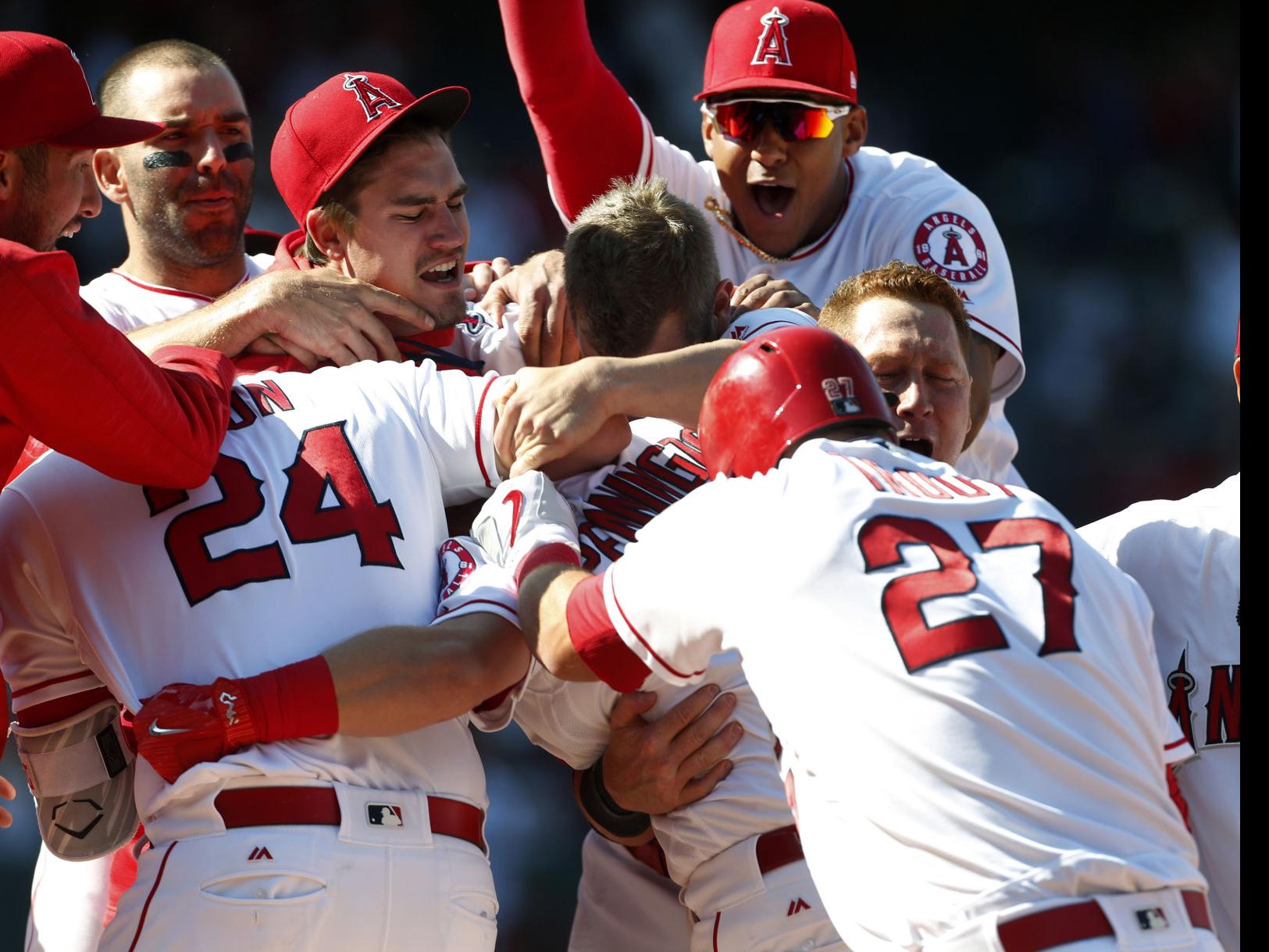 Kole Calhoun scores on wild pitch to push Angels past Mariners in 10 innings