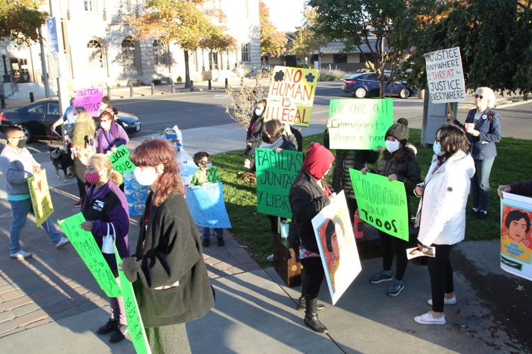 Immigrant rights activists rally in downtown Yakima to press for a