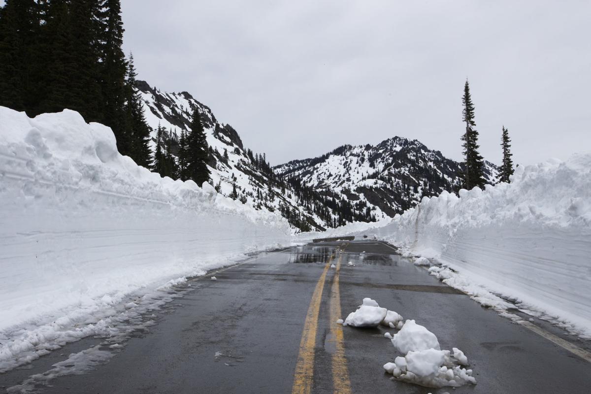 Photos Crews clear snow from Chinook Pass News