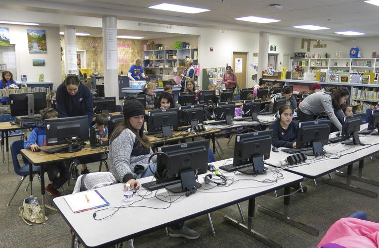 Hour of Code: Yakima kids learn introductory coding, show their parents ...