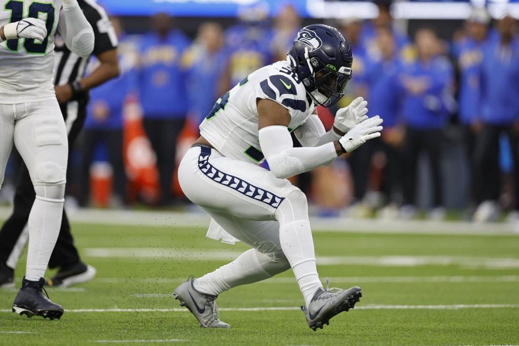 Seattle Seahawks Jordyn Brooks at practice after knee injury