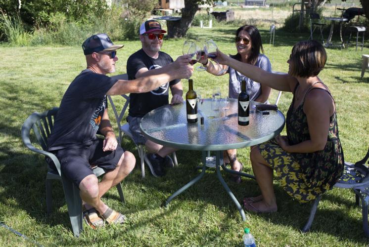 Pouring wine while RV camping at Paradisos del Sol Winery and Organic Vineyard