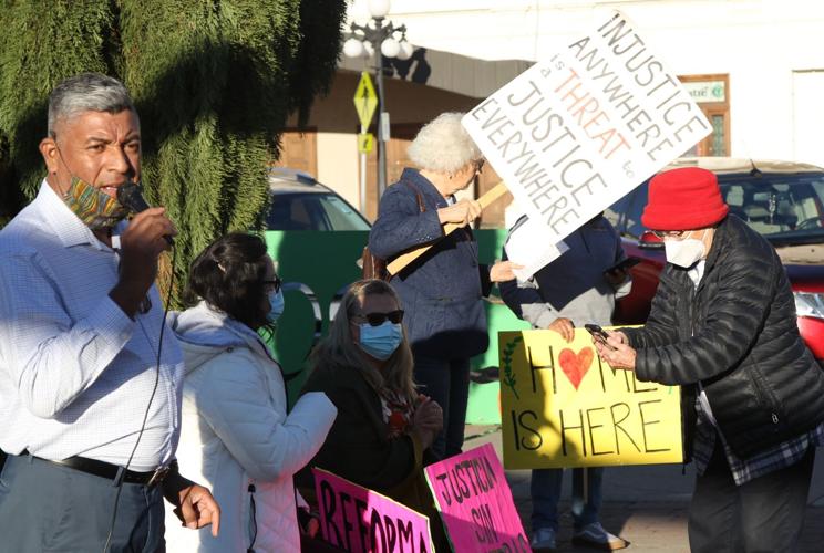 Immigrant rights activists rally in downtown Yakima to press for a