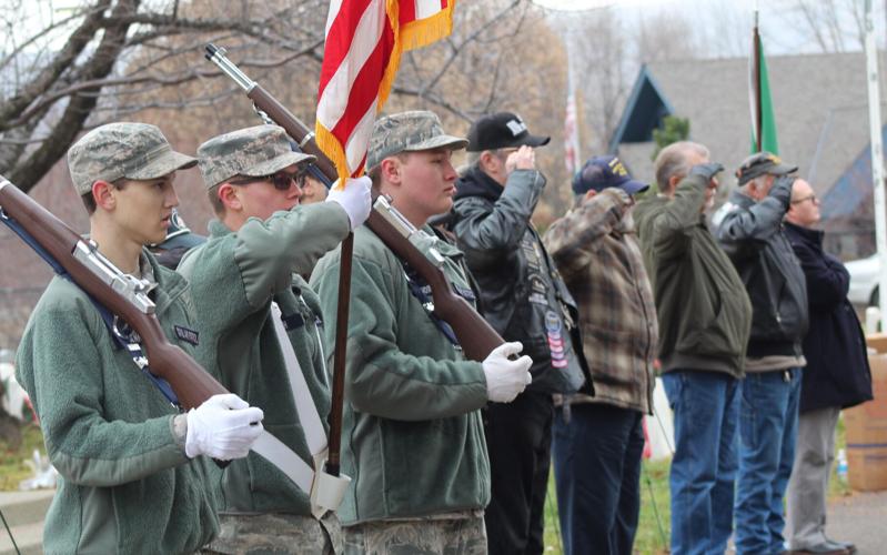 Honoring the fallen Veterans place wreaths on graves at Tahoma