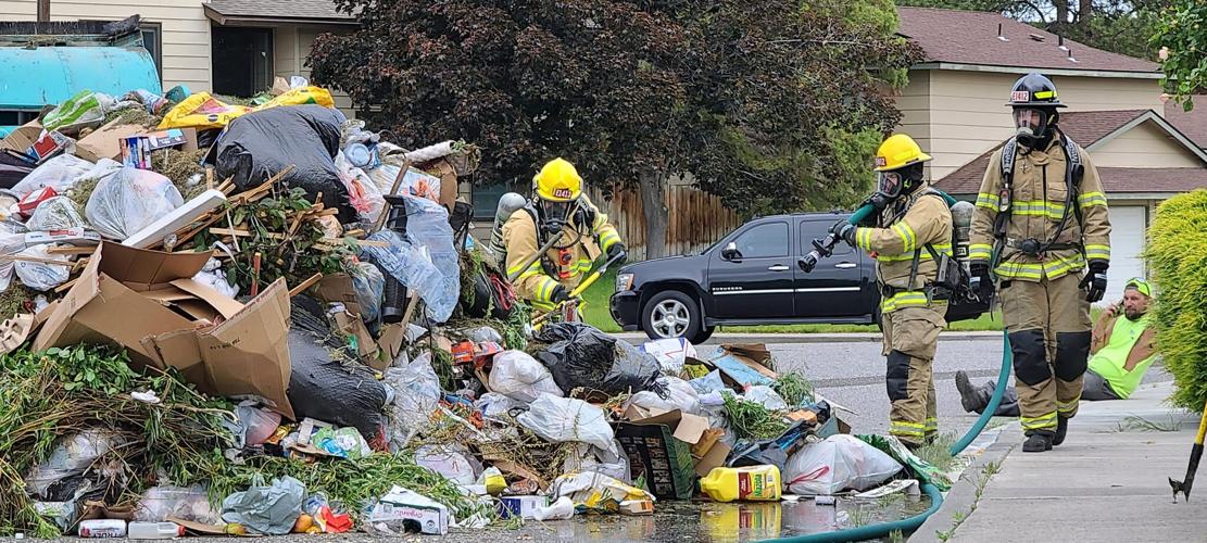 Hot Garbage Benton County firefighters put out flaming trash dumped