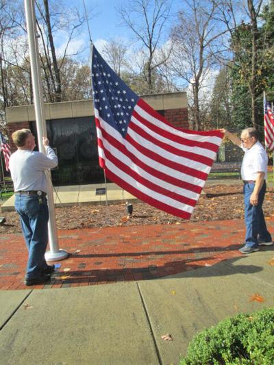 Threat of rain fails to halt flag raising | Jamestown News | yesweekly.com
