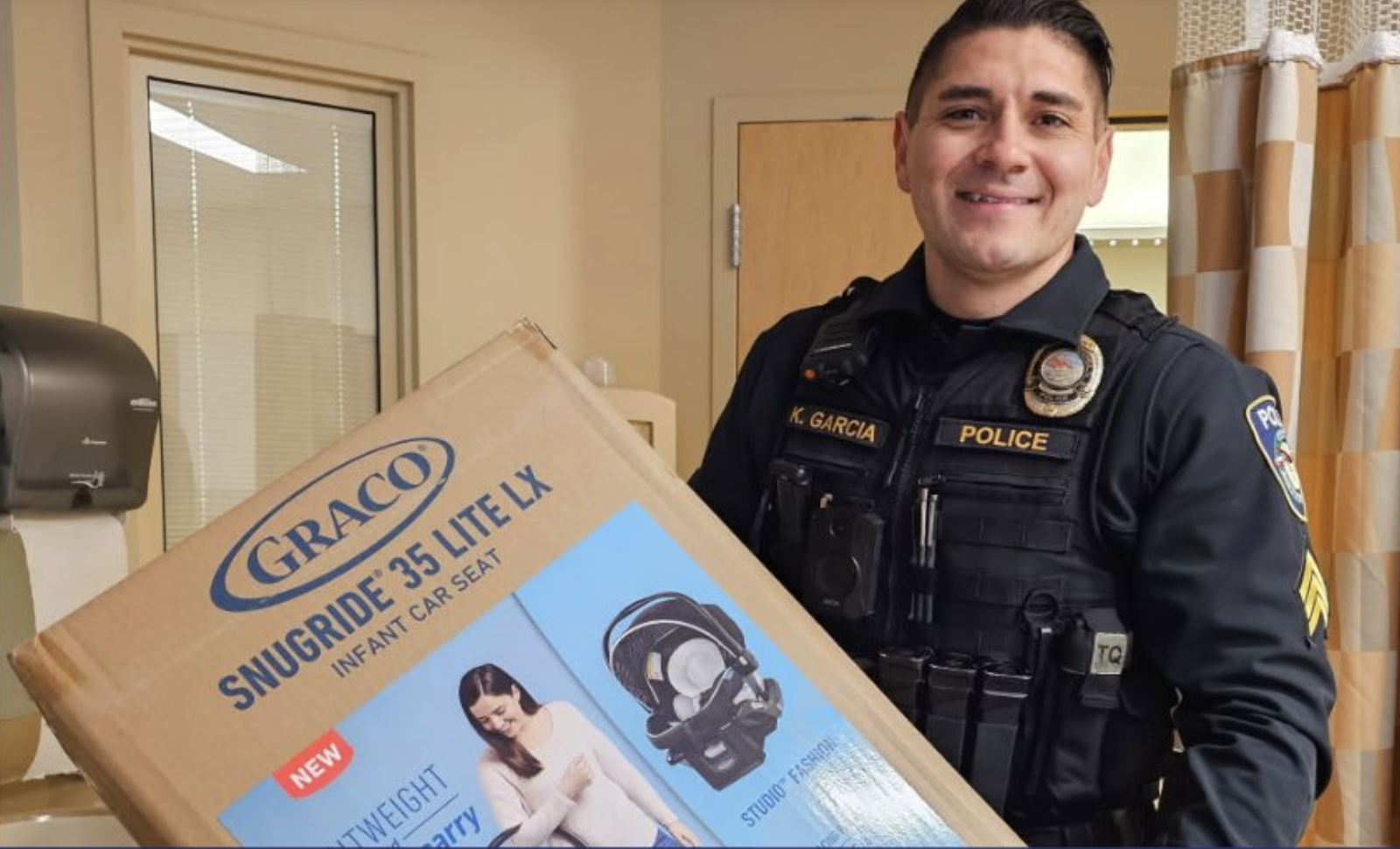 East Wenatchee Police Officer Gifts Carseat to Needy Mother | Columbia ...