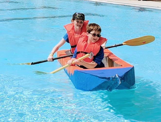 Hundreds attend cardboard boat races, Features