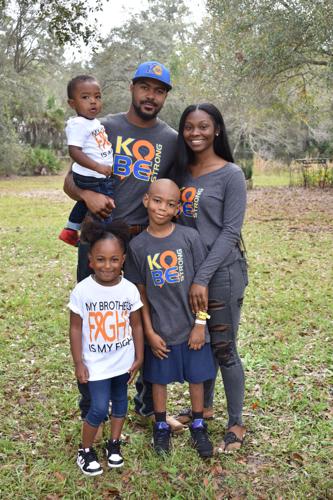 Kobe Washington with his sister Kailyn, brother Kaison, father Jordan Washington and mom Imeria Price