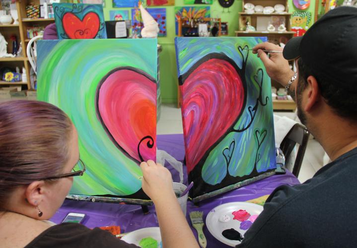 Couples paint the night away at Bisque It News Archives