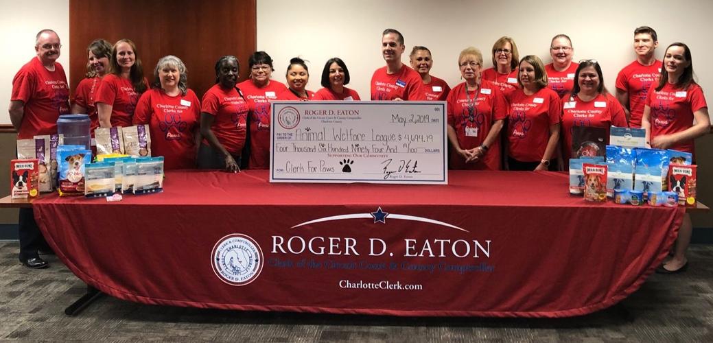 Charlotte Clerk s staff makes pawesome donation Port Charlotte News
