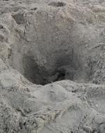 Fill in holes at the beach