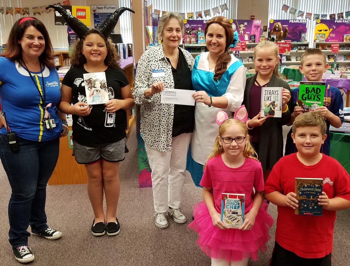 Englewood Elks buy books for MRES Features yoursun com