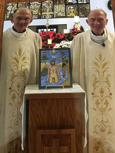Twin paints icon of the Baptism for Epiphany cathedral