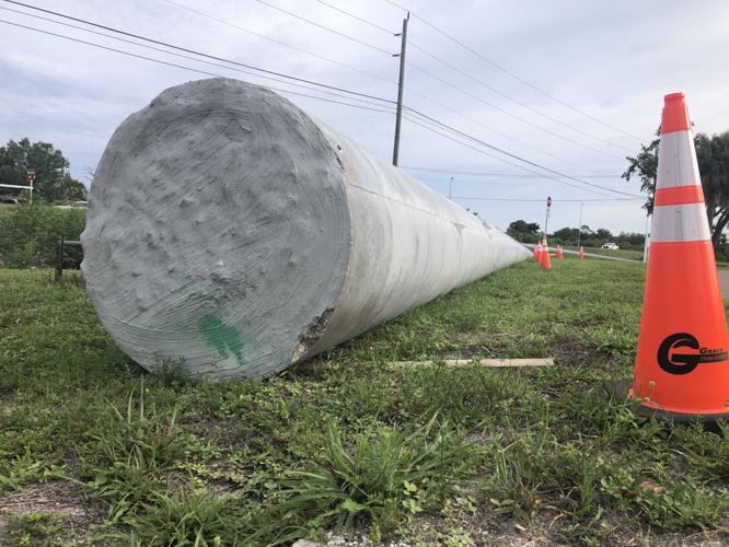 POLE POWER: FPL's new, bigger poles will carry the load