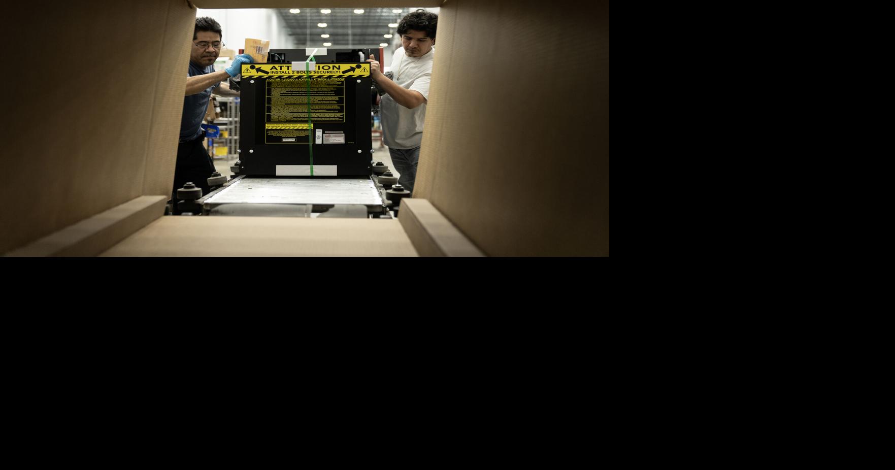 A finished pinball machine is packaged for shipping | | yoursun.com