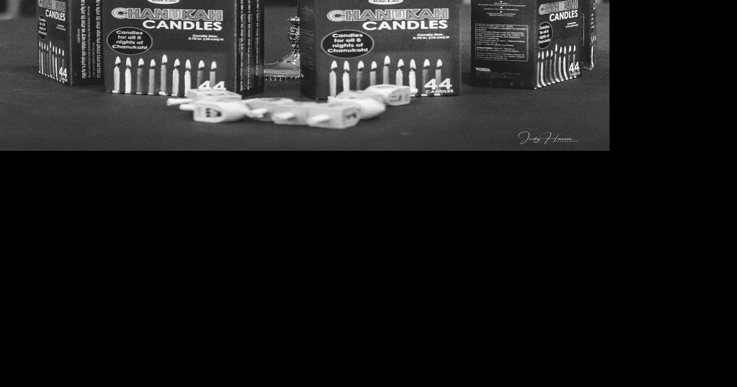 Hannukah Menorahs with candle to light and dreidels to spin