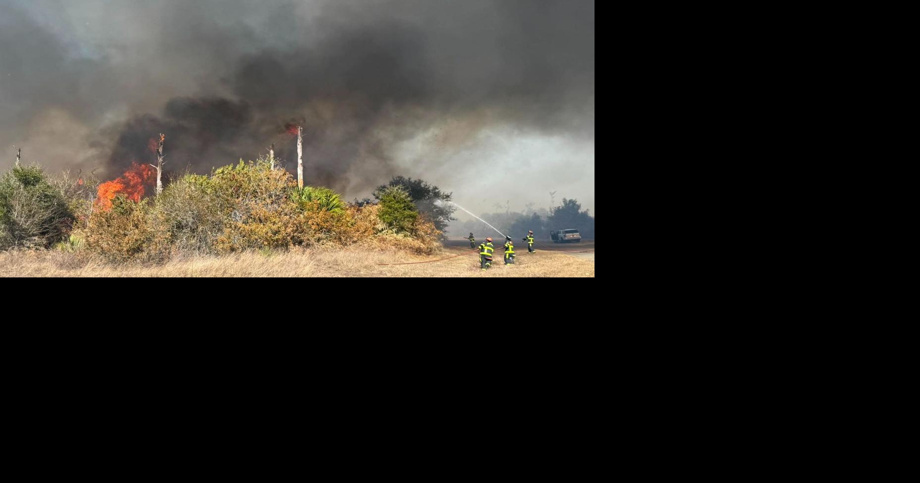 Firefighters battle brush fire near I-75; highway briefly closed | News ...