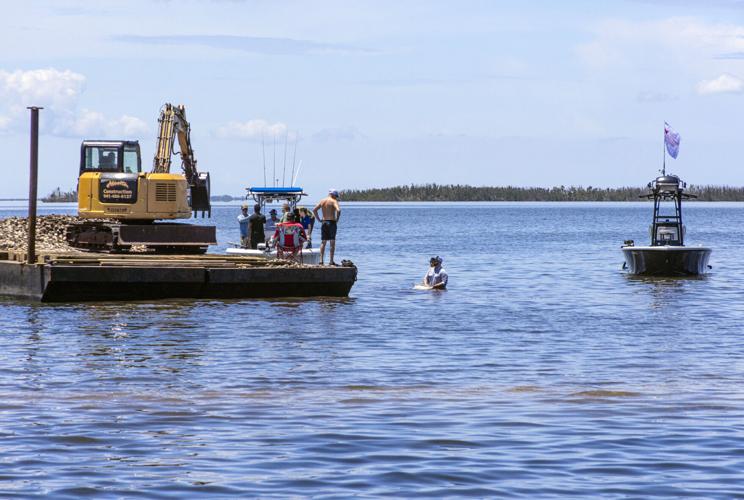 Building an oyster reef Conservation group places shells in Turtle Bay Waterline