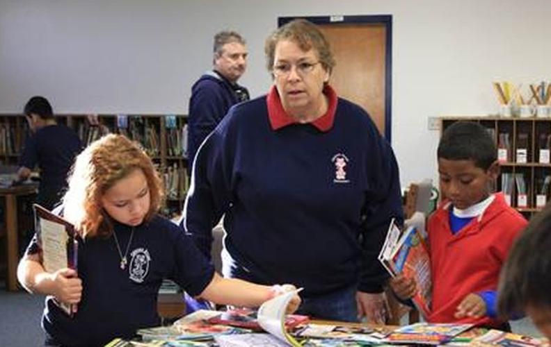 Sister follows sister in book collecting for students Newsarchives