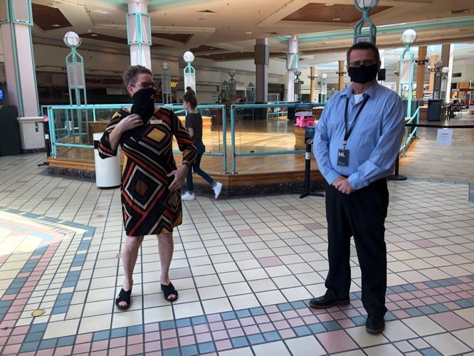 A few shoppers and walkers return in first hours of mall reopening