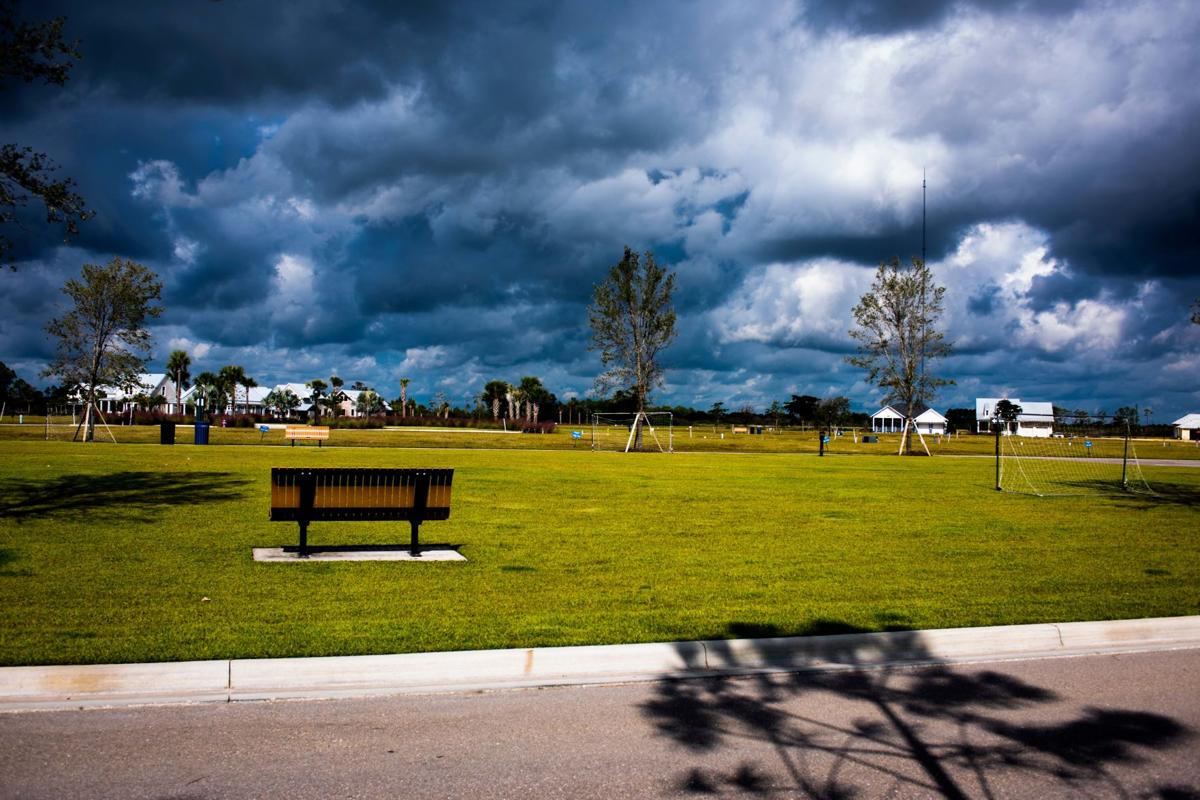 a stormy sky over the lawn at downtown babcock ranch