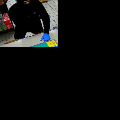 Cops search for suspect in armed robbery