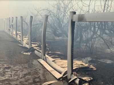 Fire melted fence.JPG (copy)
