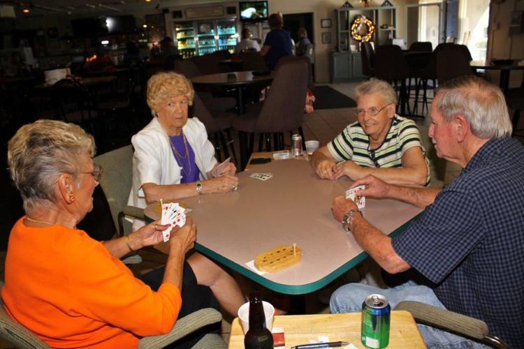 Conversation and company at AMVETS 2000 News Archives