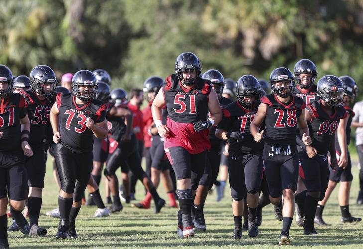 PREP FOOTBALL: Port Charlotte's high-powered offense declaws Tigers
