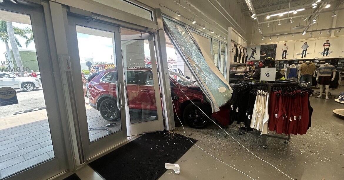 NORTH PORT: Car crashes through Old Navy storefront
