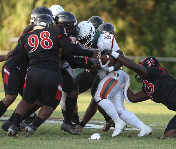 PREP FOOTBALL: Port Charlotte's high-powered offense declaws Tigers