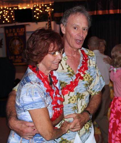 Grass skirts, coconuts and a surprise wedding reception for Ballroom ...