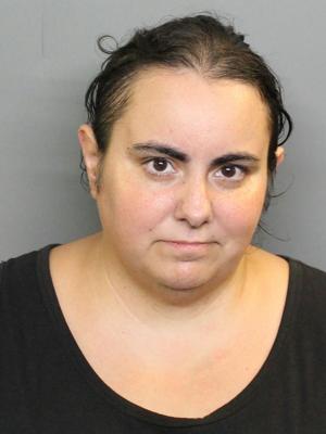 Cops: Dog-sitter stole from clients
