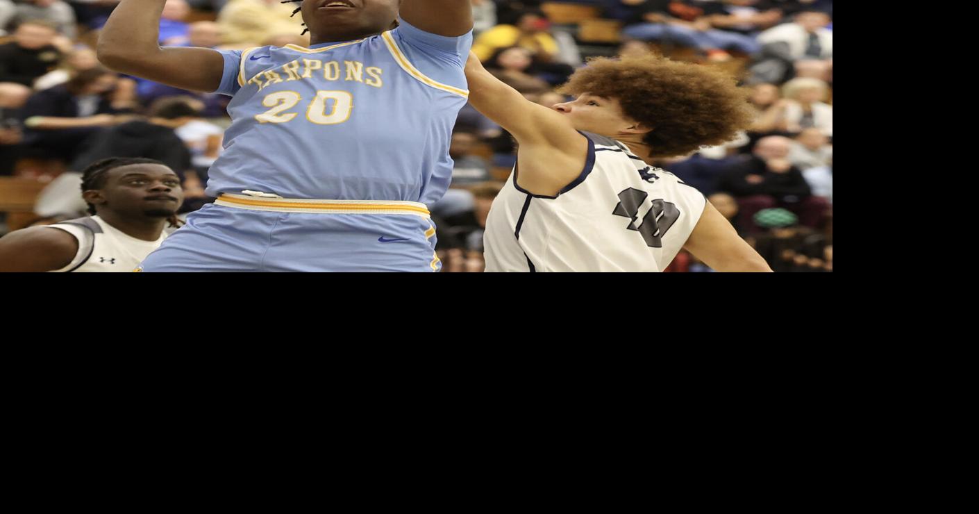 BOYS BASKETBALL: Tarpons cruise after solving Bobcat riddle
