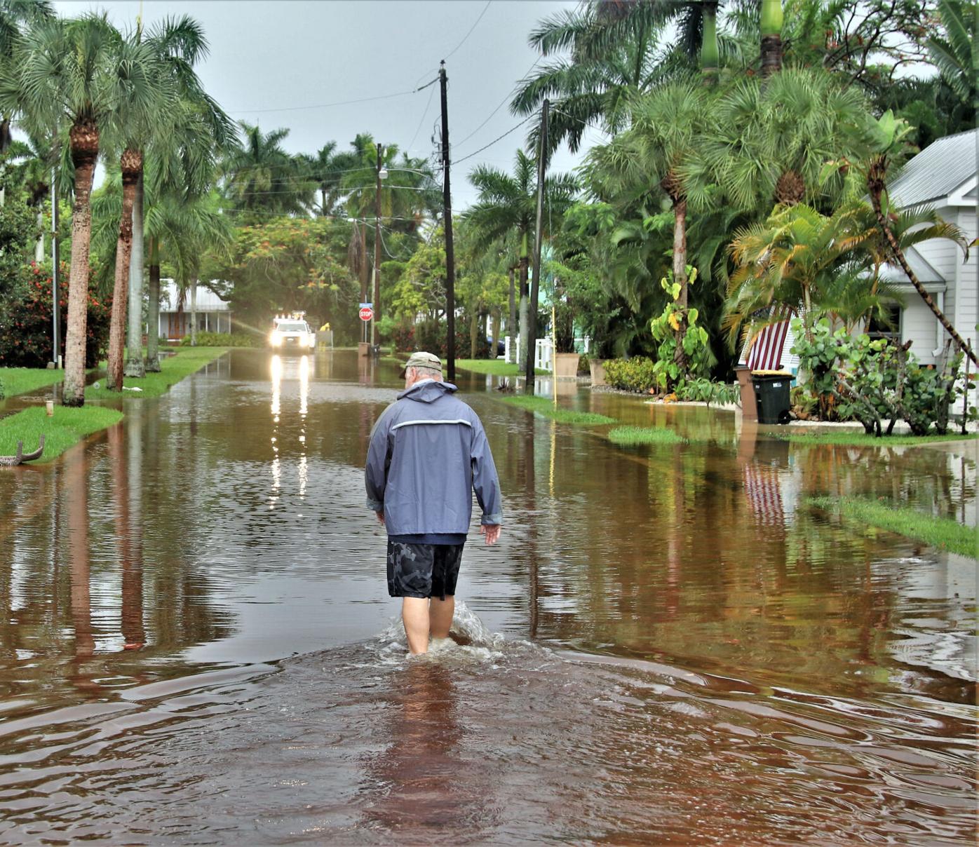 Richard Fulks, of West Virginia Avenue,  checks out  street flooding in  downtown Punta Gorda Wednesday Morning