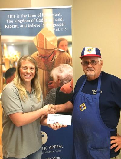 Knights of Columbus donates to Catholic Charities