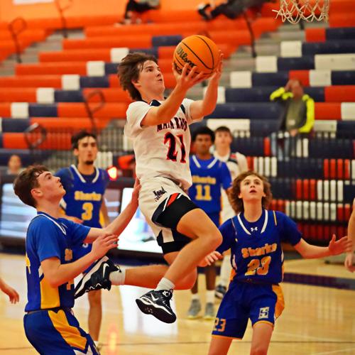 BOYS BASKETBALL finds range after halftime; Mantas sink Sharks Sun Preps