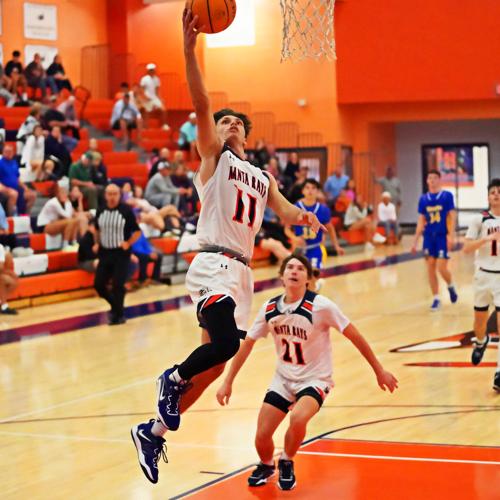 BOYS BASKETBALL finds range after halftime; Mantas sink Sharks Sun Preps