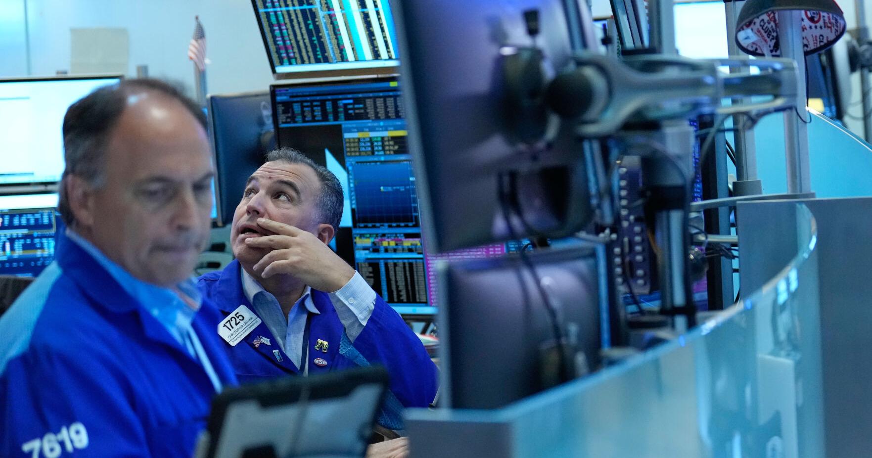 Wall Street holds near its record after Brent oil falls below $100 per barrel