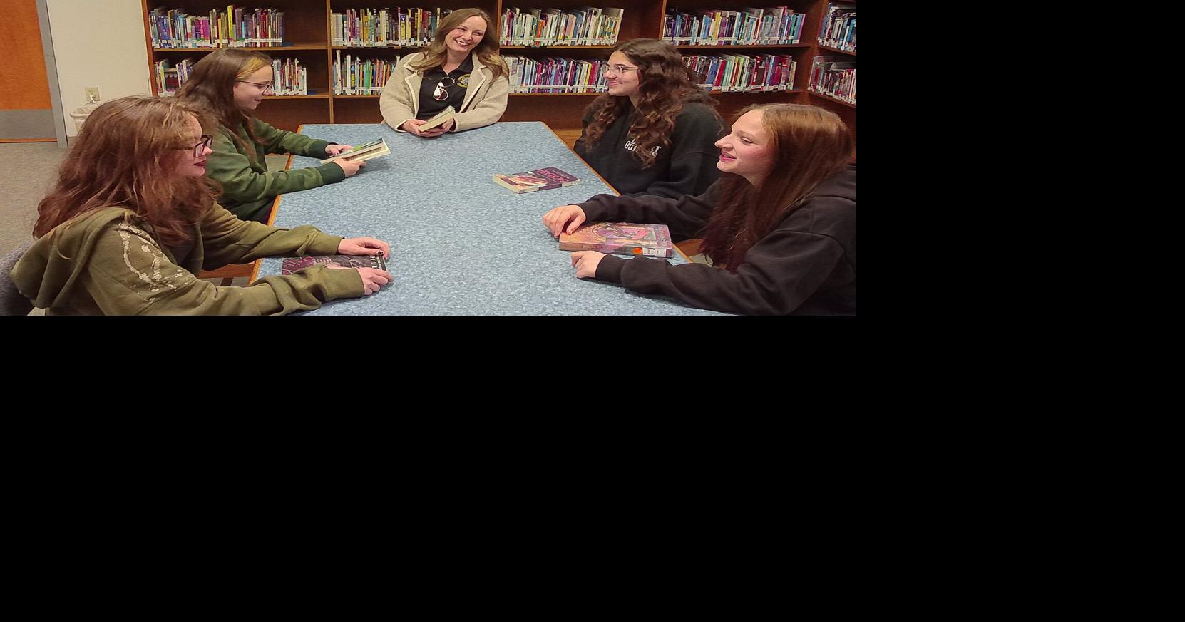 Students inject energy into life inside the school library