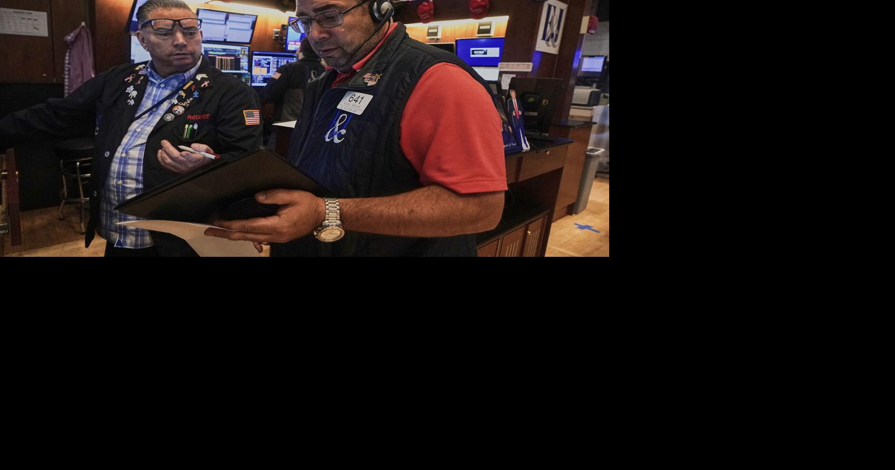 Wall Street holds near its record heights