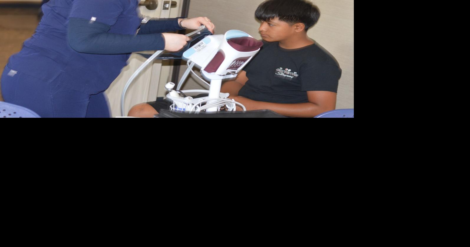 Health fairs prepare kids for their return to school